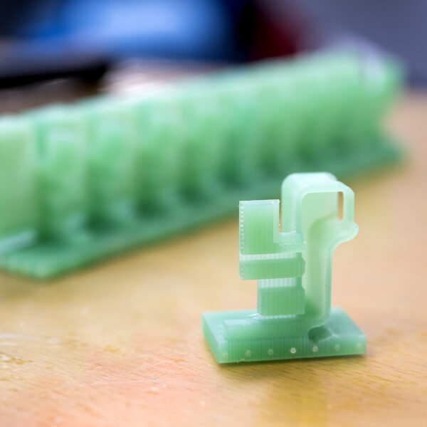 Groen kunststof onderdeel